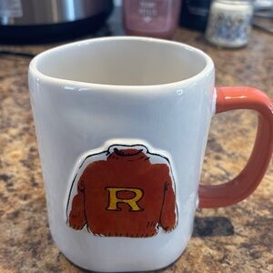 Rae Dunn White Ceramic Mug with Orange Handle and Sweater Graphic